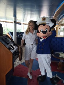 Danielle Vallone on a cruise ship with Micky Mouse