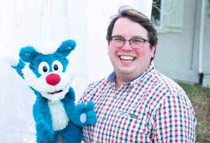 Cameron Garrity with Willie puppet