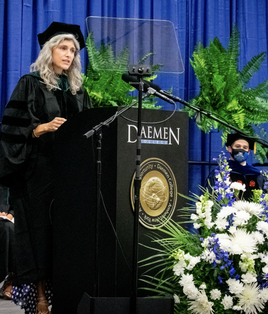 Falsone speaking at Convocation