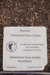 A plaque in the peace garden signifies the garden as an honorary International Peace Garden. 