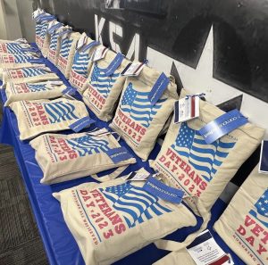 Gift bags made for Daemen veterans line a table at the ceremony.