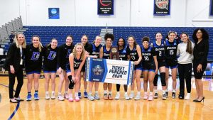 The women's basketball team after their win on Sunday night to advance to the Elite Eight.