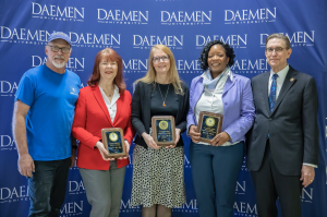 President Olson joined by the faculty and staff award winnters