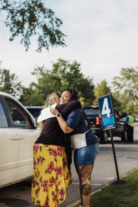 Move in working hugging a parent